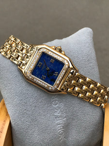 90’s Cartier Panther Lapis Dial Gold and Diamonds.