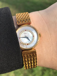 1980s vintage Piaget Yellow Gold, Mother of Pearl, Diamond & Rubies